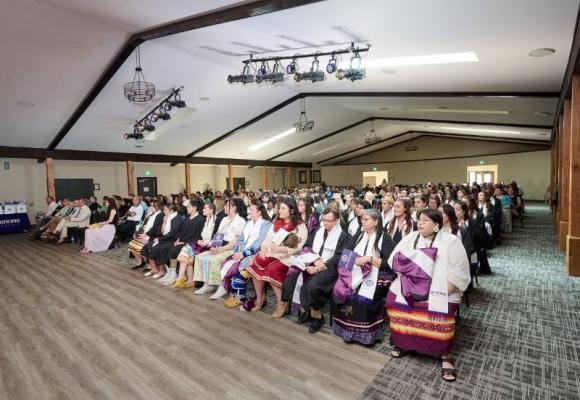 students seated in hall